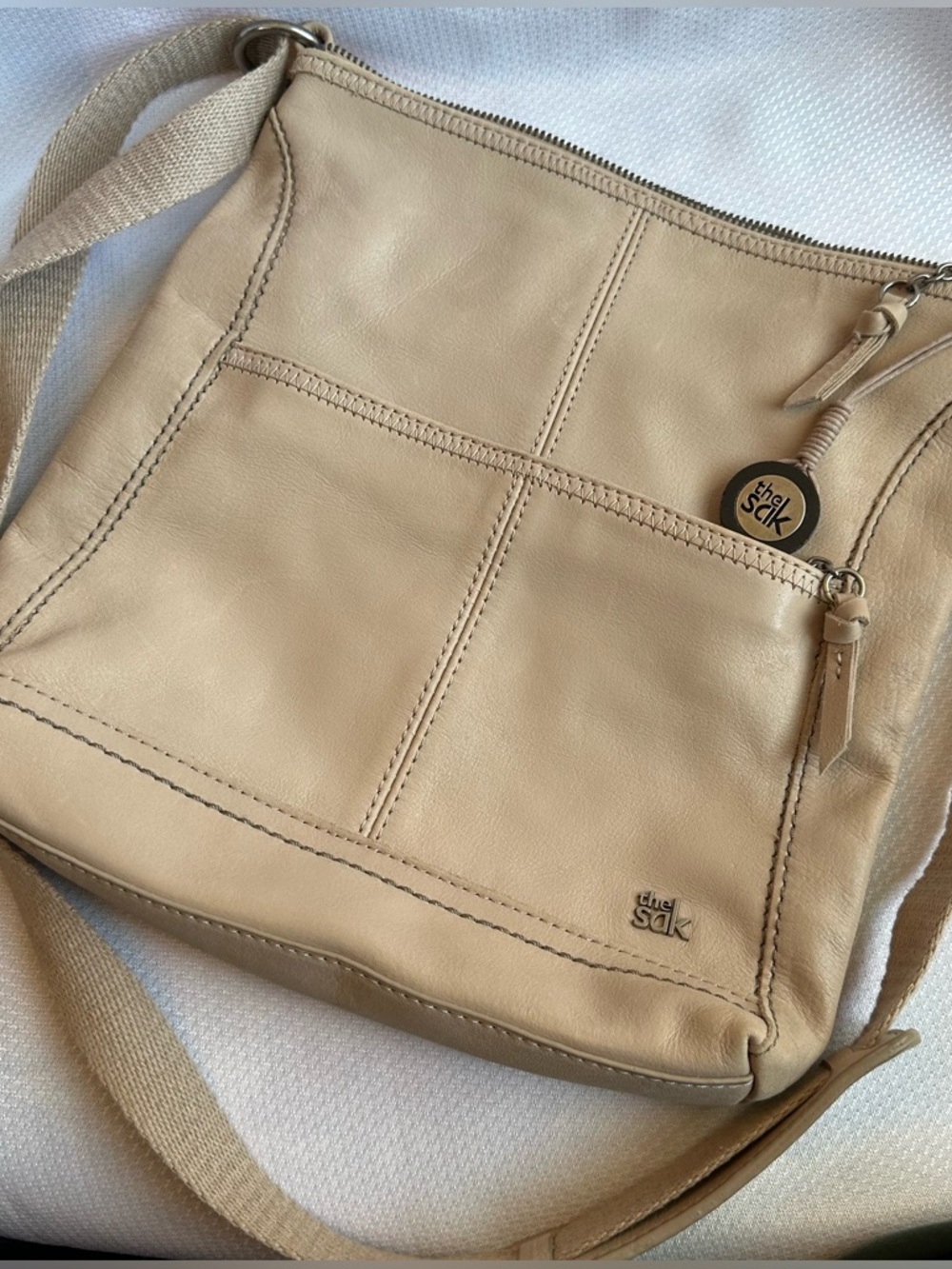 The Sak Iris Beige Leather Crossbody with Front Zip Pocket